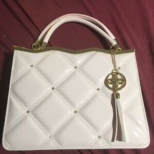 Brand new pink purse with rhinestones never used.